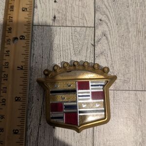 cadillac Gold and Red Emblem